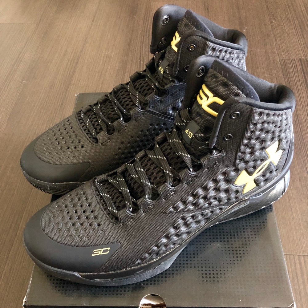 UA Curry 1 “Black & Gold Banner”